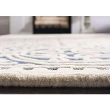 SAFAVIEH Cambridge Collection Area Rug - 8' x 10', Navy Blue & Ivory, Handmade Moroccan Wool, Ideal for High Traffic Areas in Living Room, Bedroom (CAM123G)