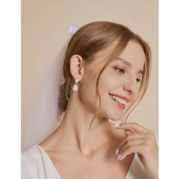 EAMTI Silver Dangle Earrings for Women Cubic Zirconia Teardrop 925 Sterling Silver Post Bridal Wedding Rhinestone Earring