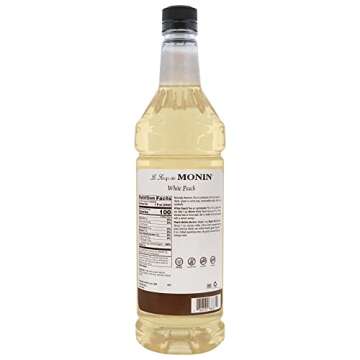 Monin - White Peach Syrup, Juicy Ripe Peach Flavor, Perfect for Cocktails, Mocktails, Iced Teas, & S...