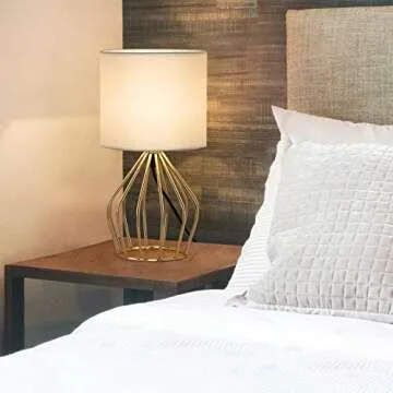 HAITRAL Gold Table Lamp - Modern Style Desk Lamp with Hollowed Out Base Linen Fabric Shade, Small Golden Bedside Lamp for Bedrooms, Living Room