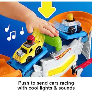 Fisher-Price Little People Hot Wheels Toddler Toy Race and Go Track Set with Lights Sounds & 2 Cars for Pretend Play Kids Ages 18+ Months​