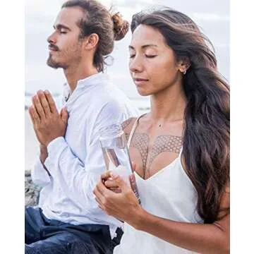 Rose Quartz Crystal Water Bottle for Healing, Wellness, 15 oz. - Infused Water Bottle with Large Crystals, Bottle Bikini Sleeve - Premium, Portable, Leakproof Glass Bottles