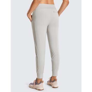 CRZ YOGA Athletic High Waisted Joggers for Women 27.5" - Lightweight Workout Travel Casual Outdoor Hiking Pants with Pockets Coconut Milk White Medium