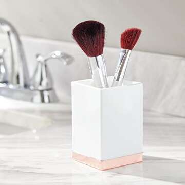 mDesign Modern Square Tumbler Cup for Bathroom Vanity Countertops - for Mouthwash/Mouth Rinse, Storing and Organizing Makeup Brushes, Eye Liners, Accessories - Slim Design - White/Rose Gold