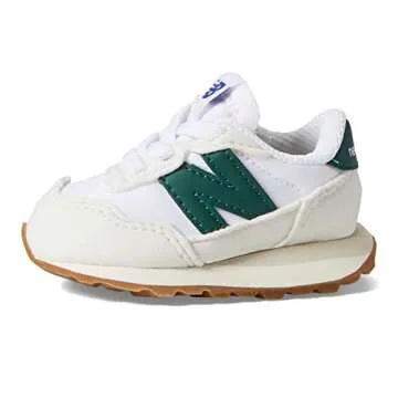 Shop New Balance Kids 237 Bungee Sneaker in Nimbus Cloud