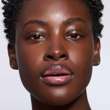 Clarins Natural Lip Perfector | Award-Winning | Sheer Finish Lip Plumping Gloss | Instant 3D Shine | Nourishing, Hydrating, Softening | Contains Natural Plant Extracts With Skincare Benefits