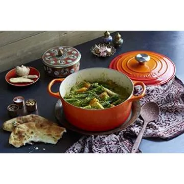 Le Creuset Enameled Cast Iron Signature Round Dutch Oven with Lid, 5.5 Quart, Flame