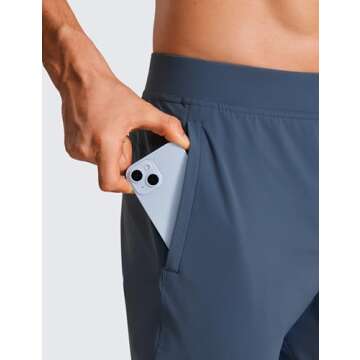 CRZ YOGA Athletic Joggers for Men - 29" Lightweight Running Training Pants with Zip Pockets and Ankle Zippers Electric Blue Medium