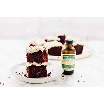 Nielsen-Massey Organic Fairtrade Madagascar Bourbon Pure Vanilla Extract,4 ounces (packaging may vary)