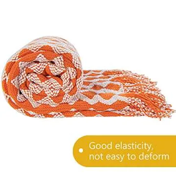 NTBAY Acrylic Knitted Throw Blanket, Lightweight and Soft Cozy Decorative Woven Blanket with Tassels for Travel, Couch, Bed, Sofa, 51x67 Inches, Orange and White Wave