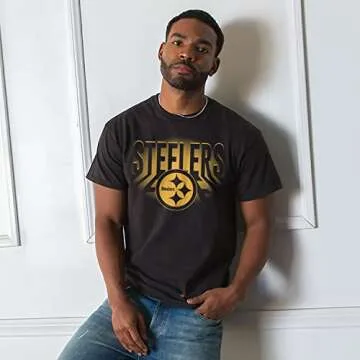 Junk Food Clothing x NFL - Pittsburgh Steelers - Team Spotlight - Unisex Adult Short Sleeve Fan T-Shirt for Men and Women - Size X-Large