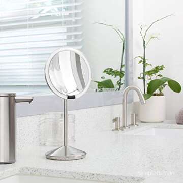 simplehuman Sensor Mirror, Travel Makeup Mirror with Lights, 10X Magnification, Lighted, Round, Free...