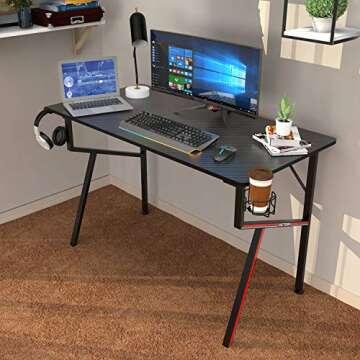 DESIGNA Gaming Desk 47'', K-Shaped Computer Desk, Office Desk Gamer Style with Mouse Pad, Cup Holder, Headphone Hook, Controller Stand, Easy to Assemble, Carbon Fiber Desktop, Black