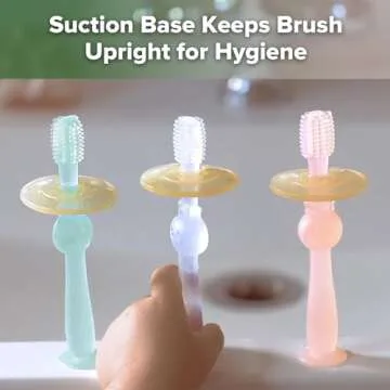 haakaa 360° Baby Toothbrush with Suction Base - Gentle Cleaning for Infant Self-Brushing Training, Food-Grade Silicone, Adjustable Safety Shield - Translucent (1 Piece)