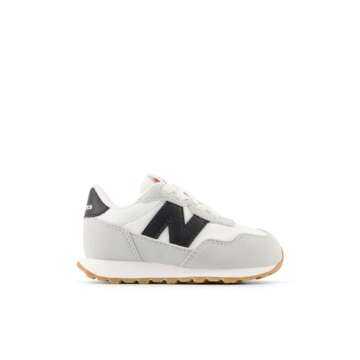 New Balance Kids 237 Bungee Sneaker, WHITE/BLACK, 10 M Toddler (1-4 Years)