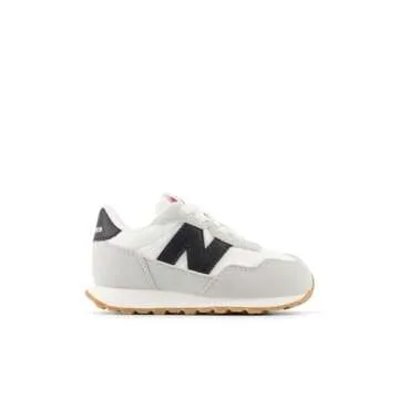 New Balance Kids 237 Bungee Sneaker, WHITE/BLACK, 10 M Toddler (1-4 Years)