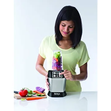 Ninja BL480D Nutri Personal Countertop Blender, Auto-iQ Technology, 1000-Watts, for Frozen Drinks, Smoothies, Sauces & More, with 18-oz. & 24-oz. To-Go Cups & Spout Lids, Black/Silver