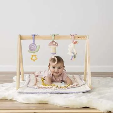 Itzy Ritzy Baby Activity Gym with Quilted Play Mat and 3 Removable Toys - Premium Wooden Baby Gym for Infant Play, Includes Playmat and 3 Coordinating Toys (Pastel Rainbow)