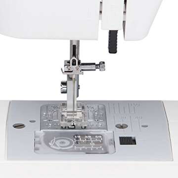 Janome MOD-15 Easy-to-Use Sewing Machine with 15 Stitches, Adjustable Stitch Length and 5-Piece Feed Dogs