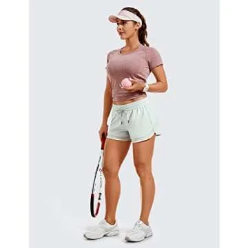 CRZ YOGA Women's Mid Rise Running Shorts Mesh Liner 3'' - Quick Dry Drawstring Workout Athletic Gym Shorts Zip Pocket Coconut Milk White Medium