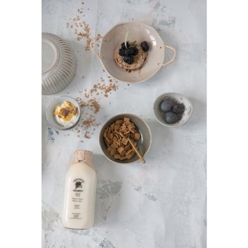 Creative Co-Op Stoneware Bowl with Rattan Handles