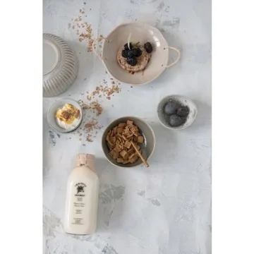 Creative Co-Op Stoneware Bowl with Rattan Handles