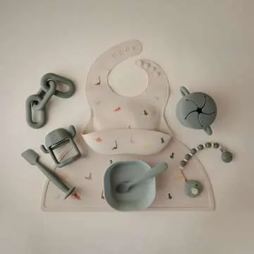 mushie Silicone Baby Bib | Adjustable Fit Waterproof Bibs (Dinosaurs)