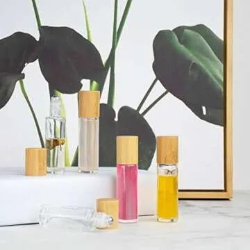 Glass Roll On Bottle with Bamboo Lid for Essential Oils, Creatiee Eco-friendly Refillable Clear Perfume Sample Bottles with Stainless Steel Roller Ball - Portable & Practical (12Pcs 15ml Clear)