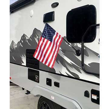 The Traveler RV Flag Pole Kit. Includes12"x18" Inch Flag, 24” Inch Flag Pole With Adjustable Angle Suction Cup Mount And Storage Bag.