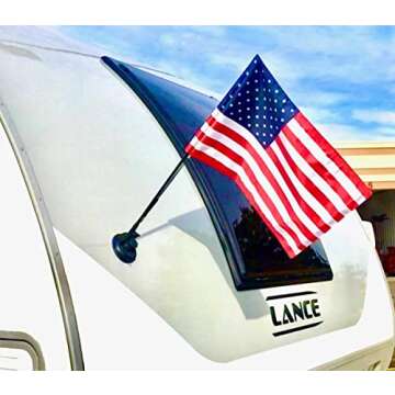 The Traveler RV Flag Pole Kit. Includes12"x18" Inch Flag, 24” Inch Flag Pole With Adjustable Angle Suction Cup Mount And Storage Bag.
