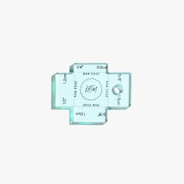 Kylie and the Machine KATM Festive Bauble Blue containing Woven Labels Mini Acrylic Label Gauge and Enamel pin in a Cute foil Bauble Box with Ribbon