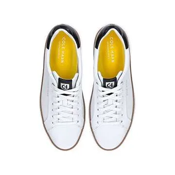 Cole Haan Women's Grandpro Topspin Sneaker, Black/Ivory/Cyber Yellow, 5