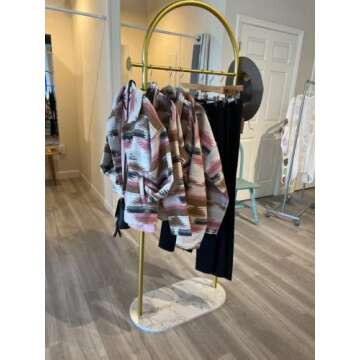 Gold Garment Rack with Marble Base for Elegant Display