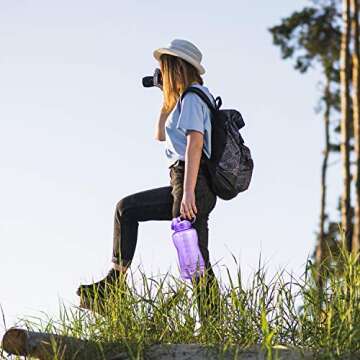 QuiFit Motivational Gallon Water Bottle - with Straw & Time Marker BPA Free 128/64 oz Large Water Jug Leak-Proof Durable for Fitness Outdoor Enthusiasts(Purple-B1, 1 Gallon)