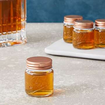 Juvale 12 Pack Mini Mason Jar Shot Glasses with Lids, 2 oz for Ginger Shots, Juices, Cocktails, Homemade Sauces