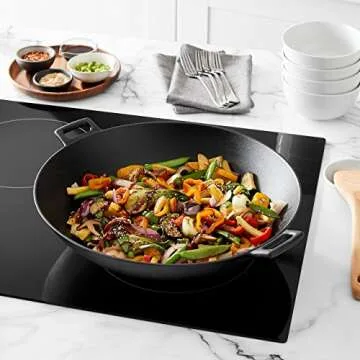 Amazon Basics Pre-Seasoned Cast Iron Wok Pan - Versatile Cooking