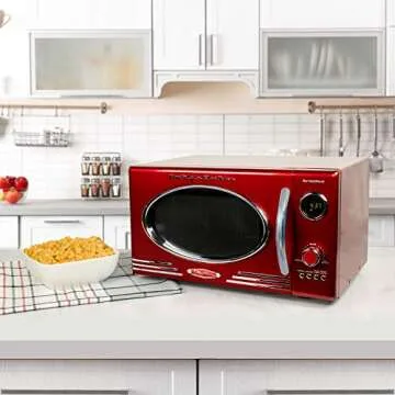 Nostalgia RMO4RR Retro Large 0.9 cu ft, 800-Watt Countertop Microwave Oven, 12 Pre-Programmed Cooking Settings, Digital Clock, Easy Clean Interior, Metallic Red