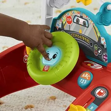 ​Fisher-Price 2-Sided Steady Speed Walker - French Edition, Interactive car, Baby Walking Toy with Activities and Learning Songs, HJP43