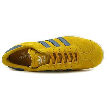 adidas Men's Gazelle Sneakers, St Nomad Yellow/Core Blue/White, 5.5