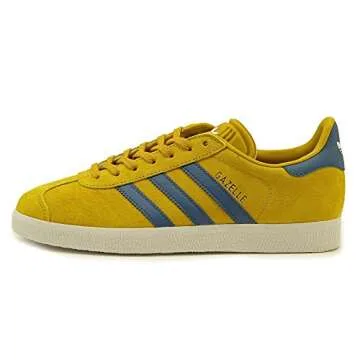 adidas Men's Gazelle Sneakers, St Nomad Yellow/Core Blue/White, 5.5