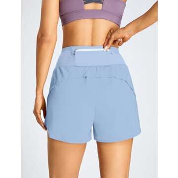 BMJL Women's Athletic Shorts Running High Waisted Shorts Pocket Sporty Workout Shorts Quick Dry Gym Shorts Pants(L,Sky Blue)
