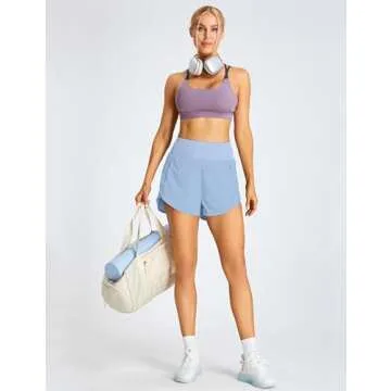 BMJL Women's Athletic Shorts Running High Waisted Shorts Pocket Sporty Workout Shorts Quick Dry Gym Shorts Pants(L,Sky Blue)