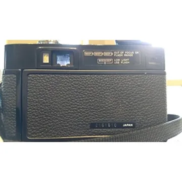 Minolta Hi-Matic AF2 35mm Film Camera with Flash and Lens