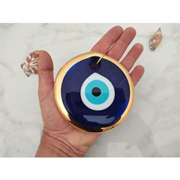 Erbulus 4.3" Glass Blue Evil Eye Wall Hanging Gold Ornament - Turkish Nazar Bead - Home Protection Charm - Wall Decor Amulet in a Box (Large)