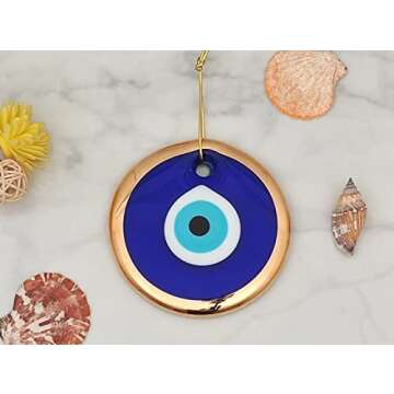 Erbulus 4.3" Glass Blue Evil Eye Wall Hanging Gold Ornament - Turkish Nazar Bead - Home Protection Charm - Wall Decor Amulet in a Box (Large)