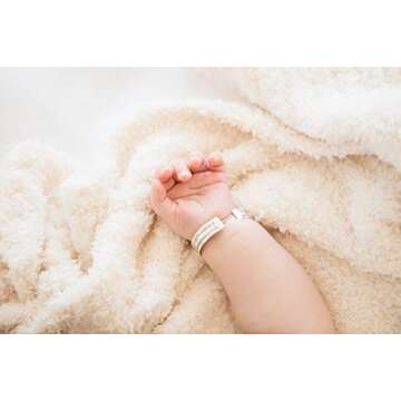 SARANONI Bamboni Luxury Baby Blanket, Breathable & Soft Plush for Infant Boys & Girls (Ivory, Mini 15” x 20”)