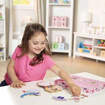 Melissa & Doug Deluxe Nina Ballerina Magnetic Dress-Up Wooden Doll With 27 Pieces of Clothing