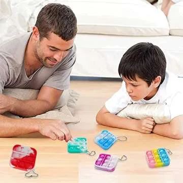 25 PCS Pop Fidget Toys Its Party Favors for Kids 4-8, 2.5*2.5 inch Mini Pop Keychain It Fidget Toy Bulk Toddler Toys Fidgets Packs Sensory Stress Toys Party Fidget Pack Popper Toy Gift for Girls Boys