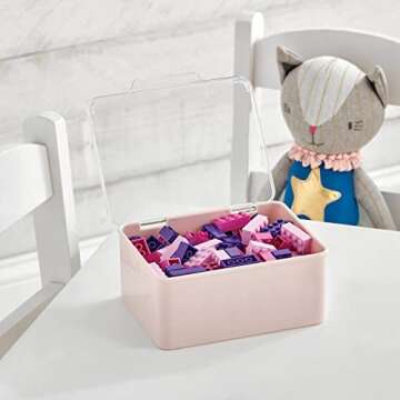 mDesign Set of 2 Children's Toy Box – Small Stackable Storage Container with Hinged Lid for Toys – Ideal for Shelves and Under Bed Storage – Clear/Light Pink