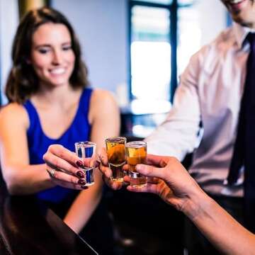 Ruckae 12 Pack 2 OZ Shot Glasses Set Clear Shot Glasses Bulk with Heavy Base Bar Cone Glass Shot Cups for Vodka Tequila Whiskey Liquor (Cone Shaped)